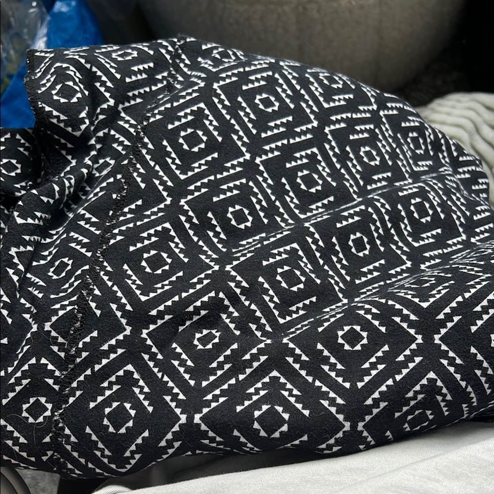 Petunia Pickle Baby Holder Aztec Print Used Black White